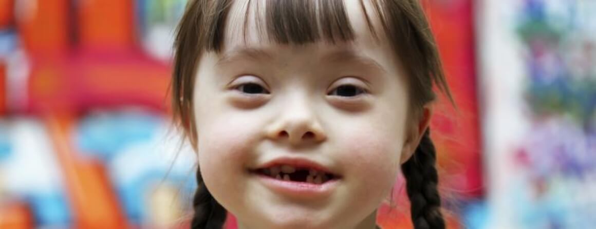 Smiling young girl with pigtails