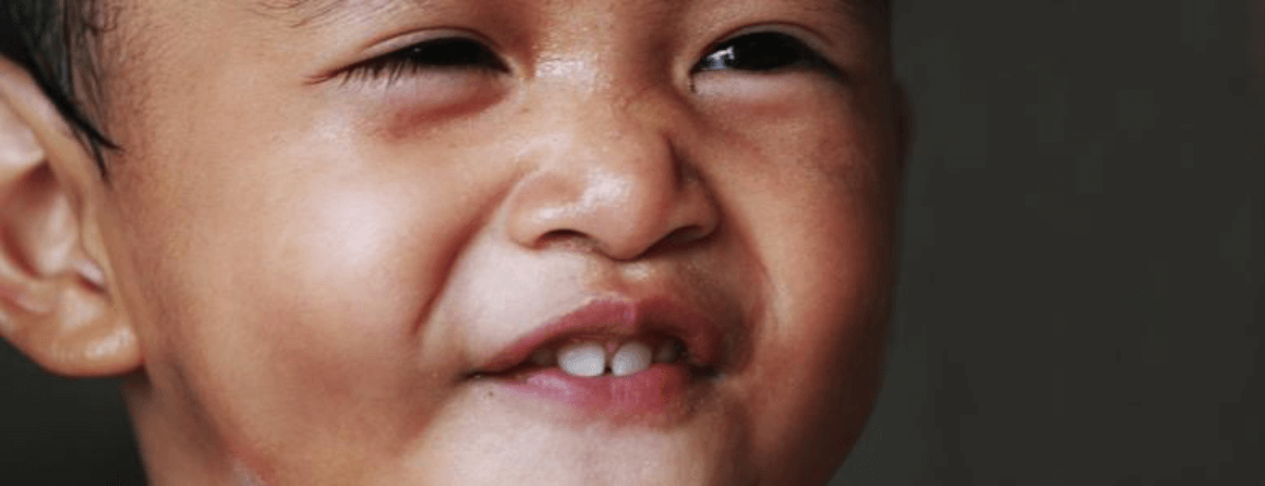 Young boy grinning