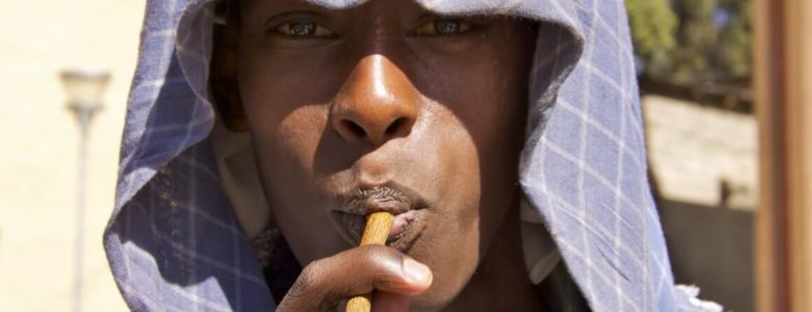 Person using miswak