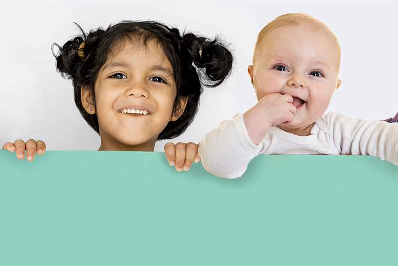 Two children smiling
