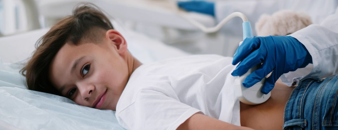 Child on bed during medical treatment