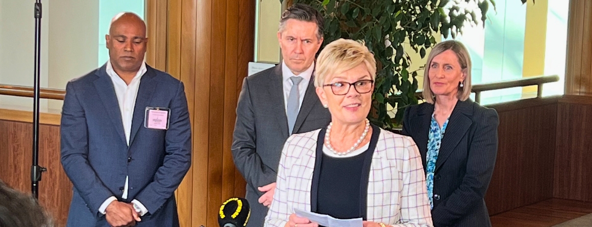 Kathryn North speaks at Parliament House with Professor Ravi Savarirayan and Federal Health Minister Mark Butler