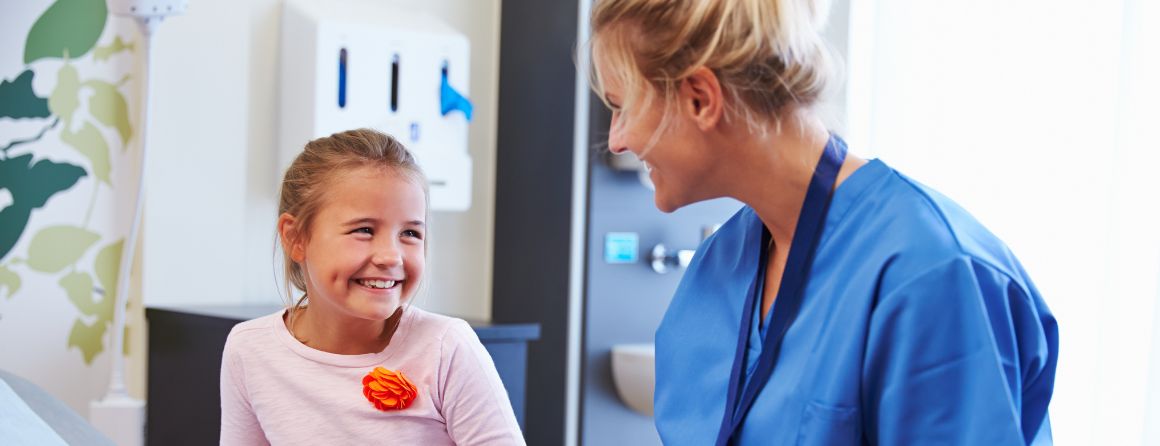 Smiling child and doctor