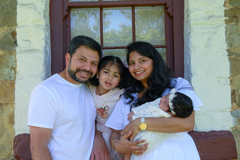 Muscular dystrophy patient Ivani and her mum Bindu and father