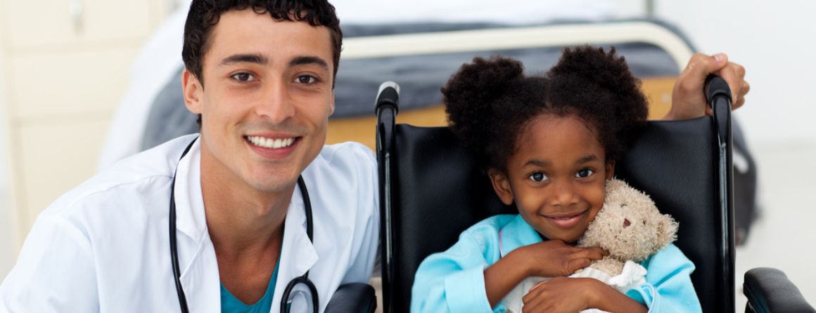 Childhood cancer doctor with patient