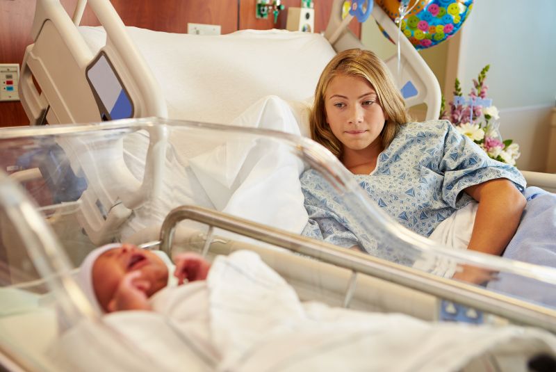 Adolescent mother and baby