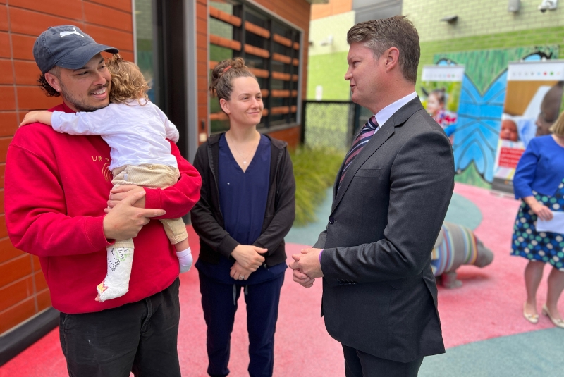 Medical Research Minister Ben Carroll speaks to Wesley and Madelaine