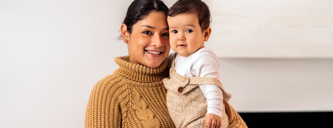 A mother holding her child
