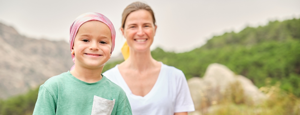A child with cancer and their mother