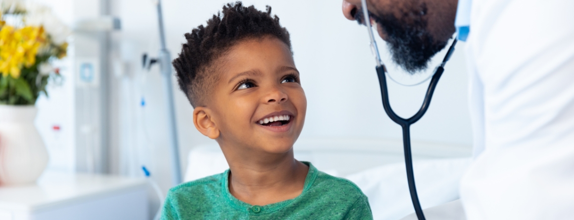 A child gets a heart check from a doctor