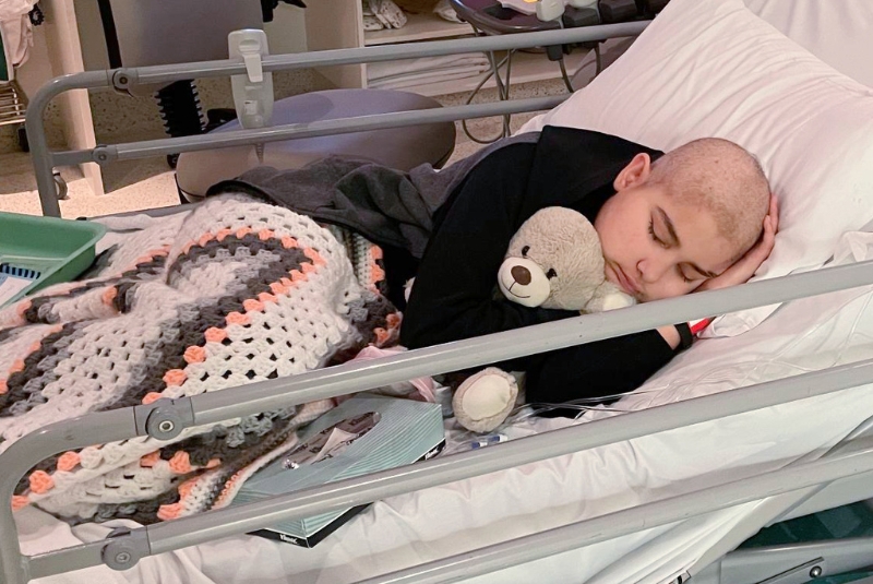 Raya in a hospital bed