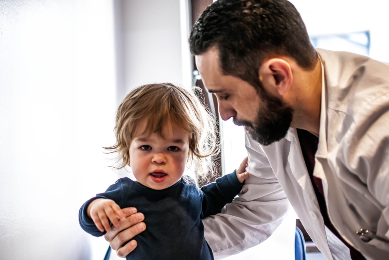 Afather with a child with achondroplasia, the most common form of dwarfism