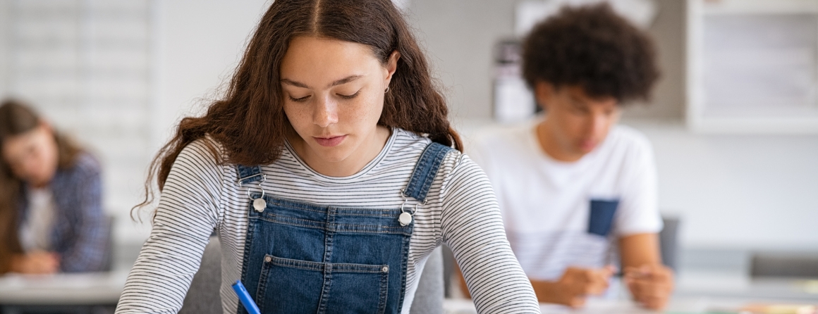An adolescent woman in school