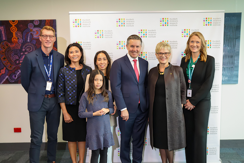 Professor Andrew Steer, Professor Mimi Tang, Debbie Sevels with her daughter Chole, Federal Health Minister Mark Butler, Professor Kathryn North AC and Professor Kristen Perrett.