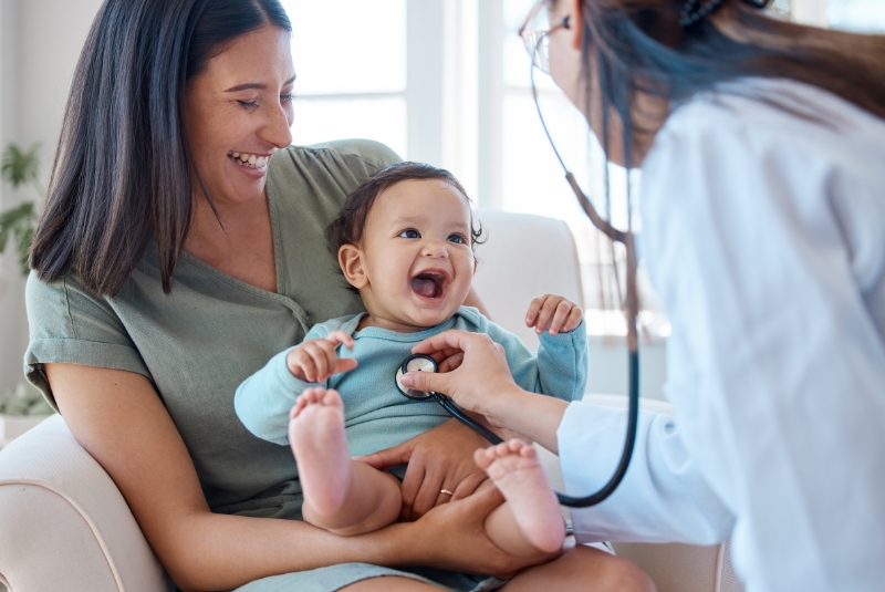 A mother and child with a doctor