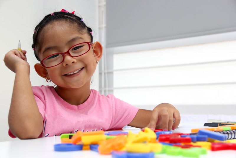 A child playing with toys