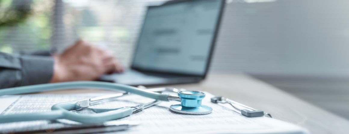 Doctor working on their computer 