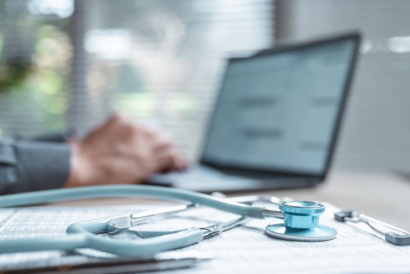 Doctor working on their computer 