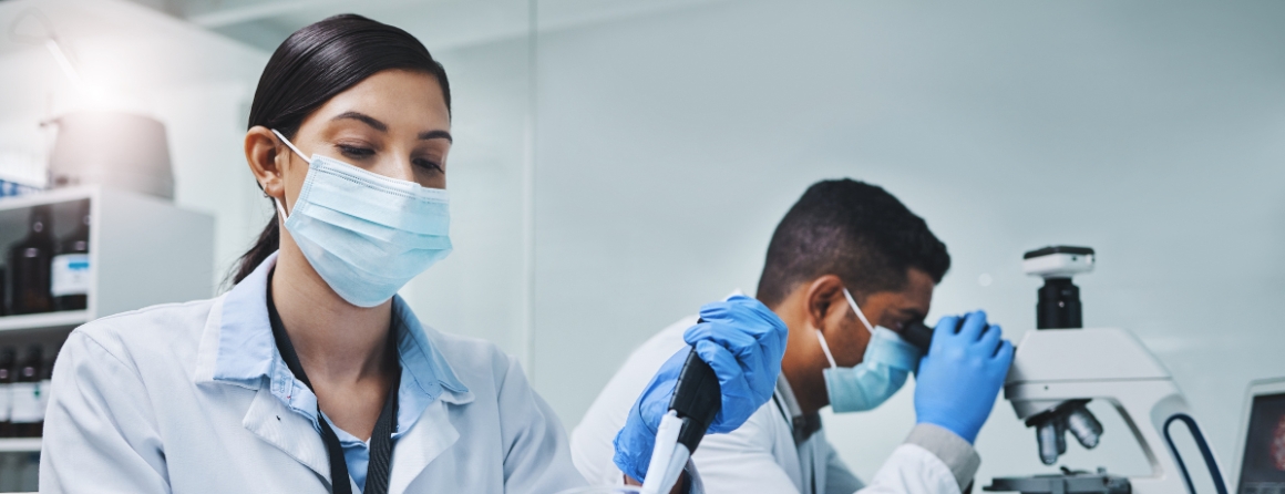 Two medical researchers in a lab