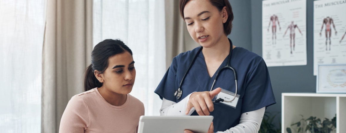 An adolescent girl is seen by a doctor