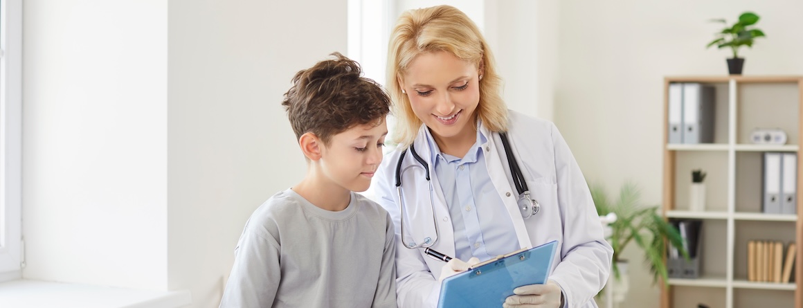 A child receives a mental health assessment from a doctor