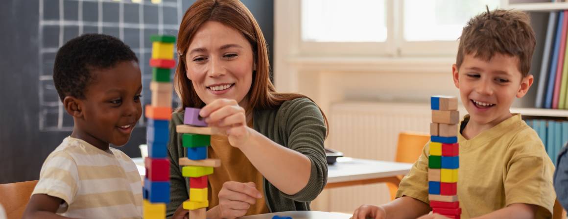 children and carer playing