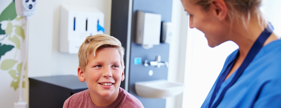 A child in a doctor's appointment with a paediatrician