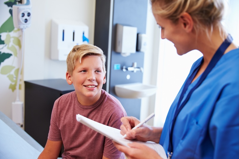 A child in a doctor's appointment with a paediatrician