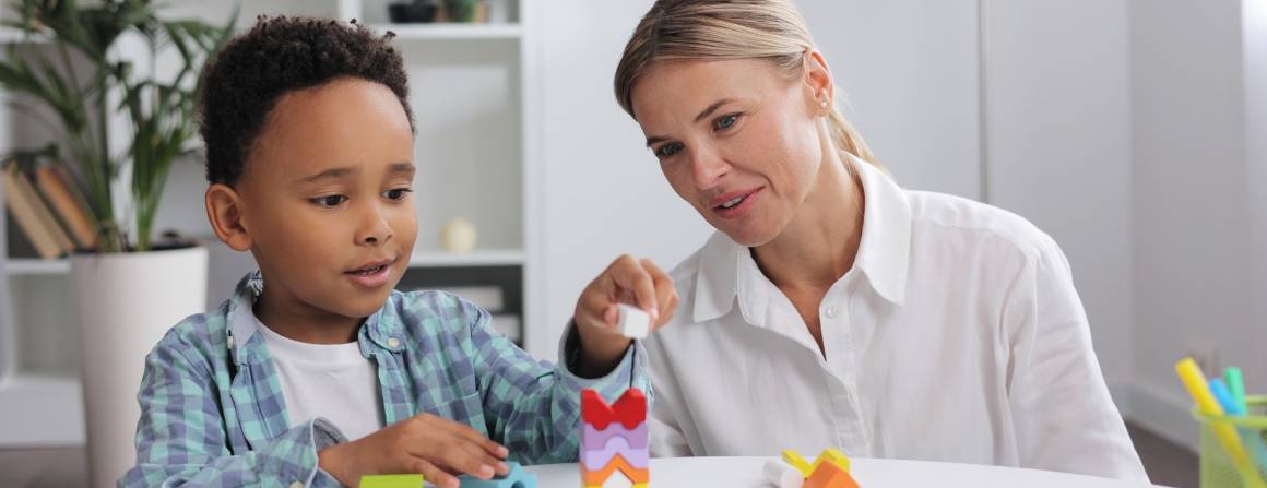 child with therapist
