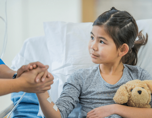 Child in hospital with a blood disorder