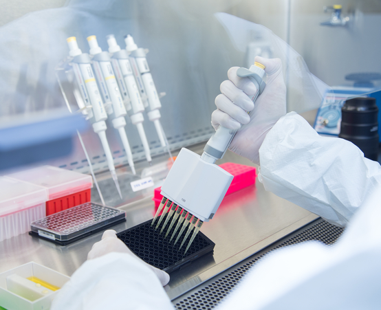 Researcher doing experiments in a lab