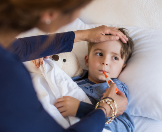 Child getting temperature tested