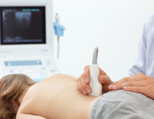 Little boy having an ultra sound on kidney
