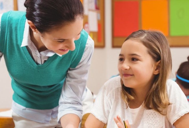 Girl with carer smiling