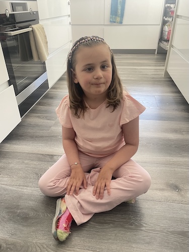 Asi, now seven, has ongoing movement, thinking, and communication issues from her infection