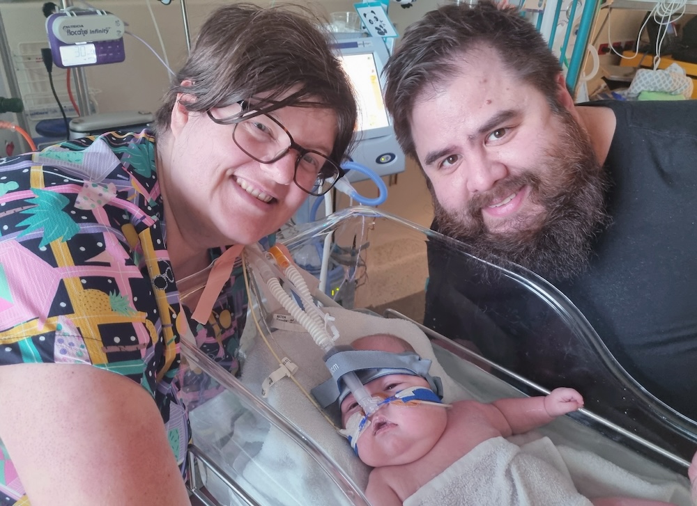 Atticus with his parents