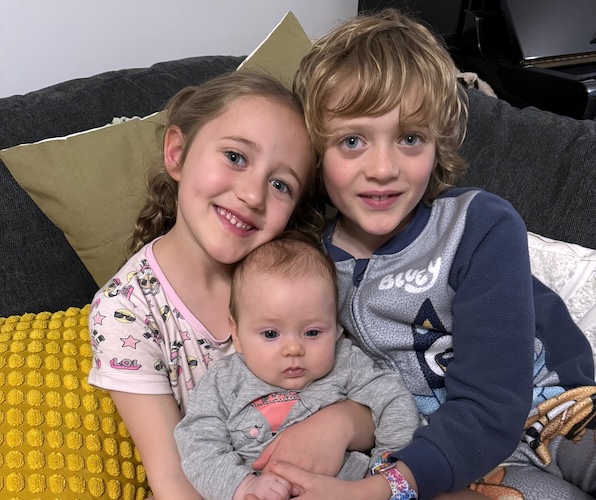 Nara (left) with her sister Leisel and brother Arlen