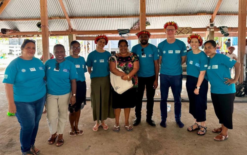 Andrew Steer with Kiribati and Solomon Islands colleagues. Shared as part of World Skin Day 2025.