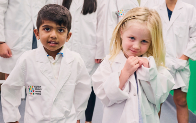 children in lab coats