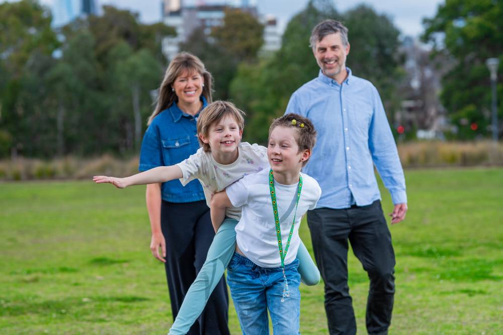 family playing in park