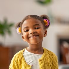 Young girl smiling at camera