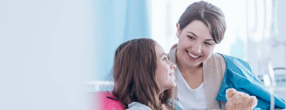 child in hospital with parent