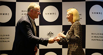 Professor Melissa Little receiving award