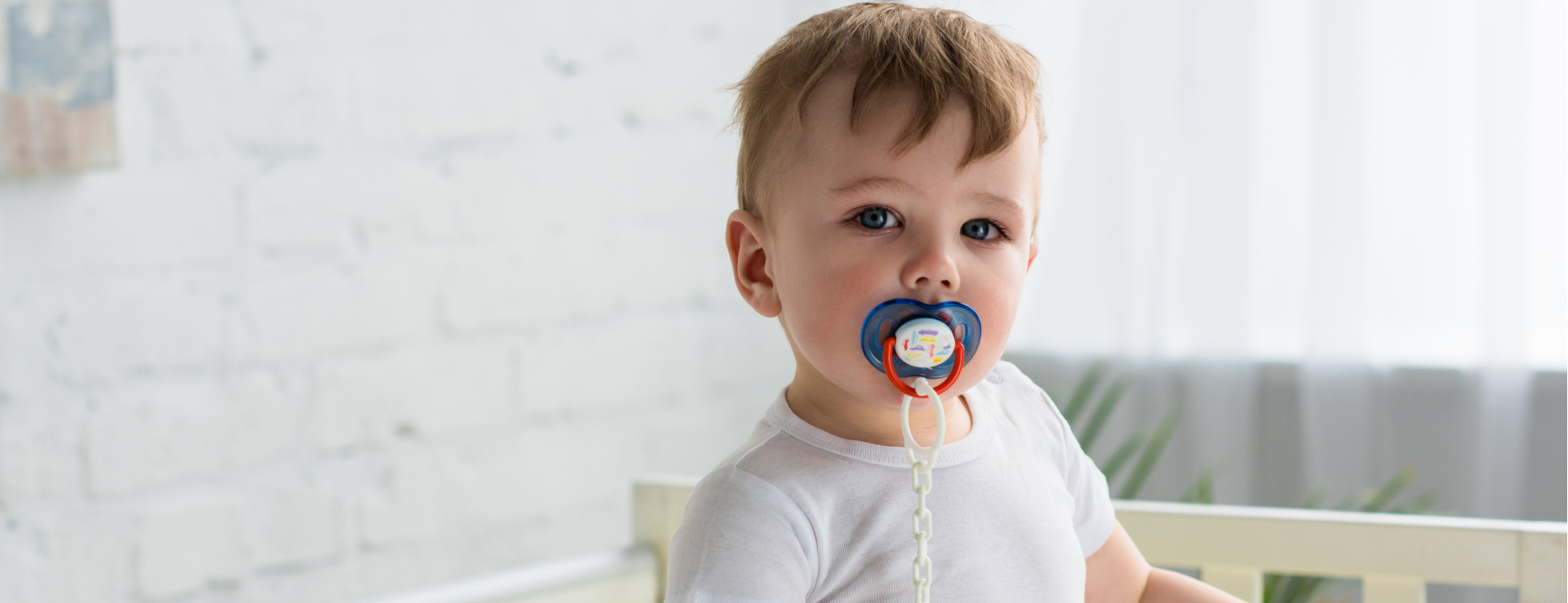 Baby with dummy