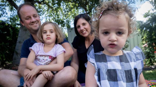 Rare disease patient Nelle with her parents Simon and Amanda