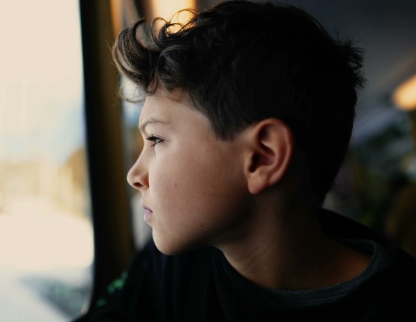 Child looking out of window