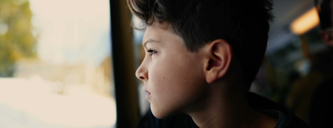 Child looking out of window