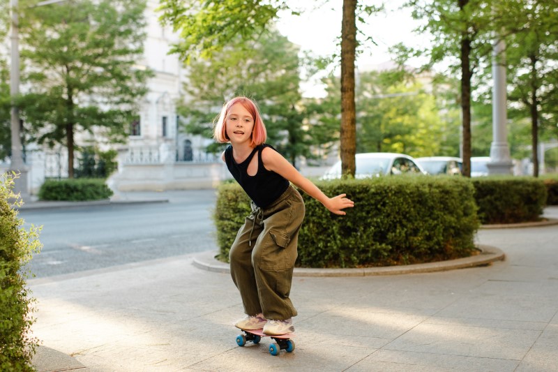 child on skateboard
