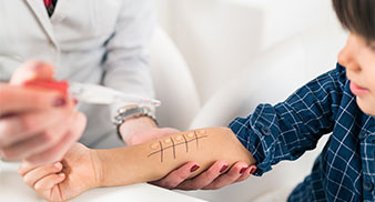 Child receiving allergy test