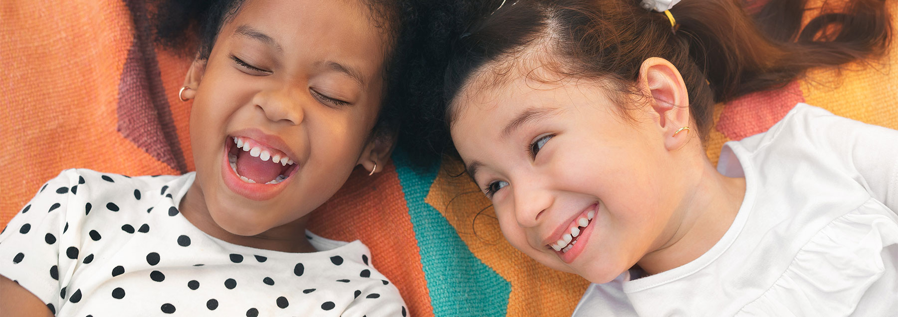 Two girls smiling
